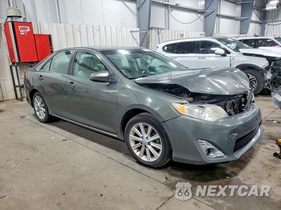 Czwarte zdjęcie samochodu z boku: 2012 TOYOTA CAMRY HYBRID XLE VIN:4T1BD1FK2CU034266 - miniatura