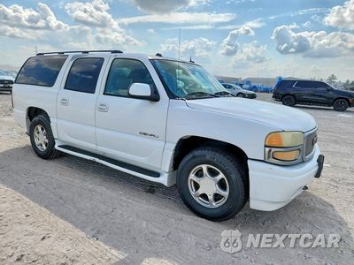 Piąte zdjęcie samochodu w środku: 2004 GMC YUKON XL DENALI VIN:1GKFK66U64J125493 - miniatura