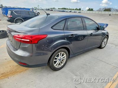 Trzecie zdjęcie samochodu z tyłu: 2018 FORD FOCUS SE VIN:1FADP3F29JL328482 - miniatura