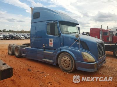 Czwarte zdjęcie samochodu z boku: 2012 VOLVO VNL SEMI TRUCK VIN:4V4NC9EG4CN536940 - miniatura