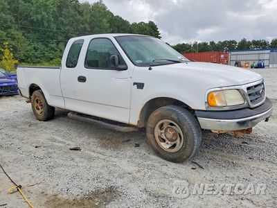 Czwarte zdjęcie samochodu z boku: 2002 FORD F150 VIN:1FTRX17W42NA08191 - miniatura