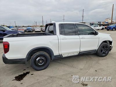 Trzecie zdjęcie samochodu z tyłu: 2021 HONDA RIDGELINE BLACK EDITION VIN:5FPYK3F82MB018400 - miniatura
