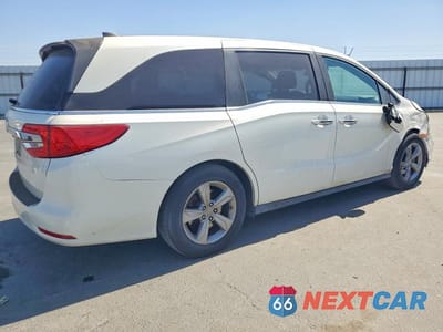 Trzecie zdjęcie samochodu z tyłu: 2018 HONDA ODYSSEY EXL VIN:5FNRL6H77JB049069 - miniatura
