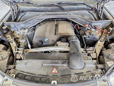 Zdjęcie 12 z 13 samochodu: 2014 BMW X5 XDRIVE35I VIN:5UXKR0C56E0K45879 - miniatura