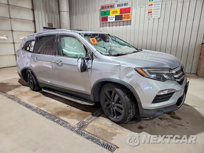 Czwarte zdjęcie samochodu z boku: 2018 HONDA PILOT ELITE VIN:5FNYF6H01JB031981 - miniatura