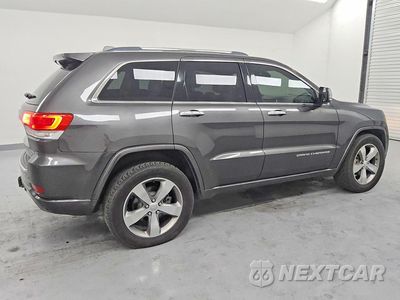 Trzecie zdjęcie samochodu z tyłu: 2015 JEEP GRAND CHEROKEE OVERLAND VIN:1C4RJFCG0FC115768 - miniatura