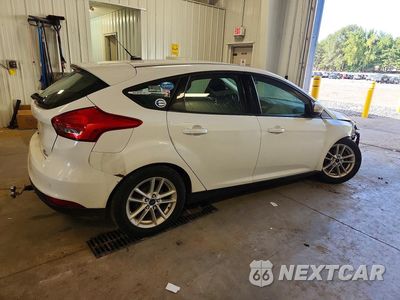 Trzecie zdjęcie samochodu z tyłu: 2016 FORD FOCUS SE VIN:1FADP3K21GL399013 - miniatura
