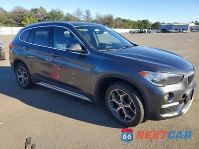 Czwarte zdjęcie samochodu z boku: 2018 BMW X1 XDRIVE28I VIN:WBXHT3C32J5L27525 - miniatura