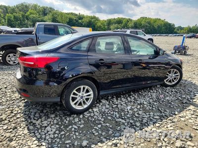 Trzecie zdjęcie samochodu z tyłu: 2017 FORD FOCUS SE VIN:1FADP3F2XHL348041 - miniatura