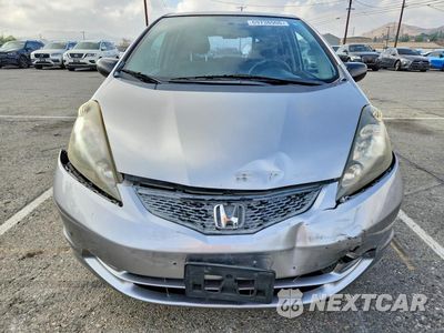 Piąte zdjęcie samochodu w środku: 2010 HONDA FIT VIN:JHMGE8H20AS007409 - miniatura