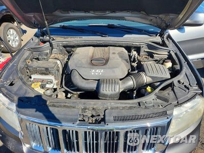 Zdjęcie 12 z 13 samochodu: 2012 JEEP GRAND CHEROKEE LAREDO VIN:1C4RJFAG4CC115691 - miniatura