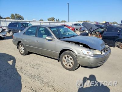 Czwarte zdjęcie samochodu z boku: 1999 TOYOTA CAMRY LE V6 VIN:JT2BF28K9X0191722 - miniatura
