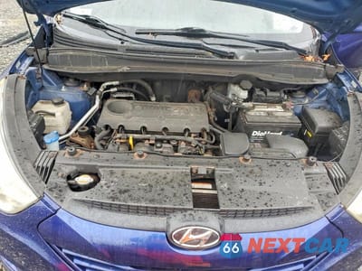 Zdjęcie 12 z 13 samochodu: 2010 HYUNDAI TUCSON GLS VIN:KM8JUCAC6AU081594 - miniatura