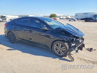 Czwarte zdjęcie samochodu z boku: 2018 HYUNDAI ELANTRA VALUE EDITION VIN:5NPD84LFXJH309884 - miniatura