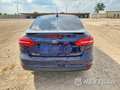 Zdjęcie 6 z 12 samochodu: 2016 FORD FOCUS TITANIUM VIN:1FADP3J24GL347652 - miniatura