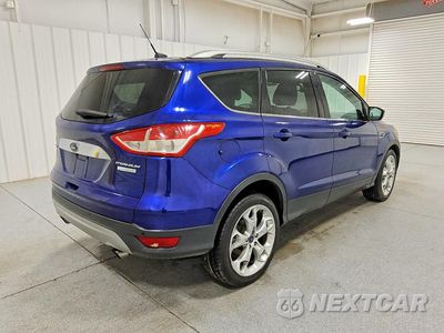 Trzecie zdjęcie samochodu z tyłu: 2014 FORD ESCAPE TITANIUM VIN:1FMCU0J96EUB49023 - miniatura