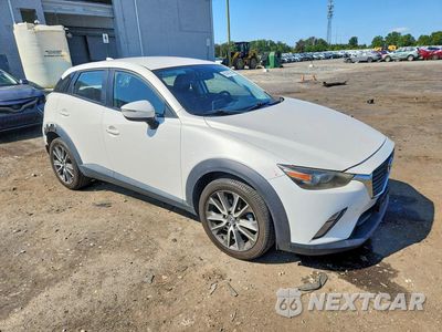Czwarte zdjęcie samochodu z boku: 2017 MAZD CX-3 TOURI VIN:JM1DKFC7XH0146697 - miniatura