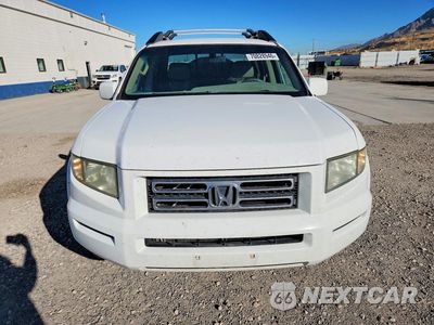 Piąte zdjęcie samochodu w środku: 2006 HONDA RIDGELINE RTL VIN:2HJYK16586H544946 - miniatura