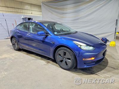 Czwarte zdjęcie samochodu z boku: 2023 TESLA MODEL 3 VIN:5YJ3E1EB7PF694289 - miniatura