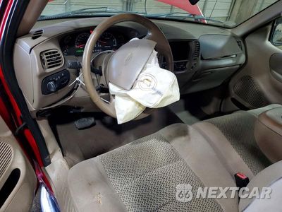 Zdjęcie 8 z 12 samochodu: 2002 FORD F150 VIN:1FTRX18L22NB58384 - miniatura