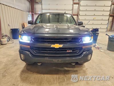 Piąte zdjęcie samochodu w środku: 2018 CHEVROLET SILVERADO K1500 LT VIN:3GCUKREC0JG459643 - miniatura