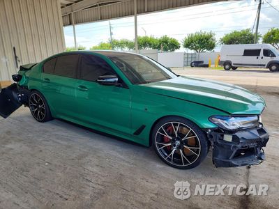 Czwarte zdjęcie samochodu z boku: 2023 BMW M550XI VIN:WBA13BK0XPCL38631 - miniatura