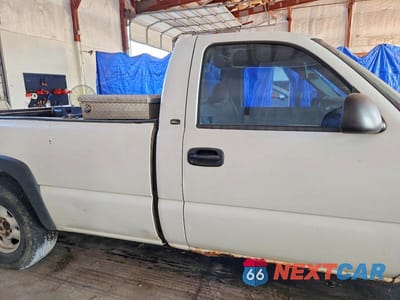 Zdjęcie 10 z 12 samochodu: 2000 GMC NEW SIERRA K1500 VIN:1GTEK14T3YE319837 - miniatura