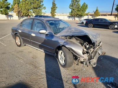 Czwarte zdjęcie samochodu z boku: 2003 HYUNDAI SONATA BASE VIN:KMHWF25SX3A787788 - miniatura