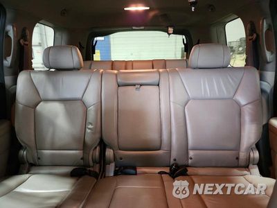 Zdjęcie 10 z 13 samochodu: 2011 HONDA PILOT EXL VIN:5FNYF4H56BB049961 - miniatura