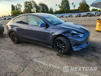 Czwarte zdjęcie samochodu z boku: 2023 TESLA MODEL Y VIN:7SAYGAEE5PF913358 - miniatura