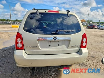 Zdjęcie 6 z 14 samochodu: 2005 MAZDA TRIBUTE S VIN:4F2YZ06155KM41529 - miniatura