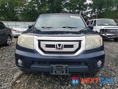 Piąte zdjęcie samochodu w środku: 2011 HONDA PILOT EX VIN:5FNYF4H49BB032112 - miniatura