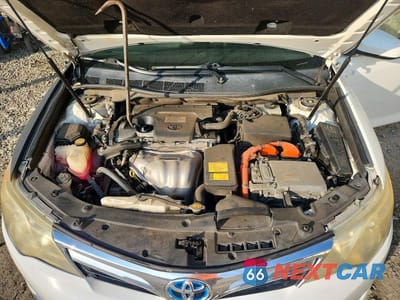 Zdjęcie 11 z 12 samochodu: 2014 TOYOTA CAMRY HYBRID XLE VIN:4T1BD1FK5EU118777 - miniatura