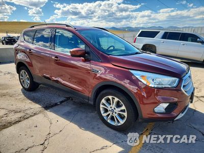 Czwarte zdjęcie samochodu z boku: 2018 FORD ESCAPE SEL VIN:1FMCU9HD8JUA64290 - miniatura