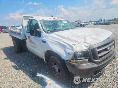 Czwarte zdjęcie samochodu z boku: 2003 FORD F350 SUPER DUTY DUMP TRUCK VIN:1FDWF36S93ED67128 - miniatura