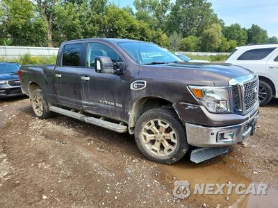 Czwarte zdjęcie samochodu z boku: 2017 NISSAN TITAN XD SV VIN:1N6BA1F41HN523397 - miniatura