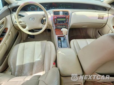 Zdjęcie 8 z 12 samochodu: 2002 TOYOTA AVALON XLS VIN:4T1BF28B12U251612 - miniatura