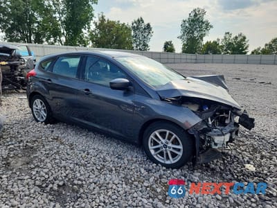Czwarte zdjęcie samochodu z boku: 2018 FORD FOCUS SE VIN:1FADP3K28JL218187 - miniatura