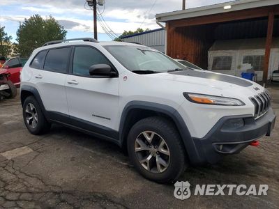 Czwarte zdjęcie samochodu z boku: 2014 JEEP CHEROKEE TRAILHAWK VIN:1C4PJMBS8EW182262 - miniatura
