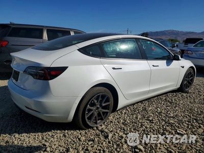 Trzecie zdjęcie samochodu z tyłu: 2021 TESLA MODEL 3 VIN:5YJ3E1EA2MF074923 - miniatura