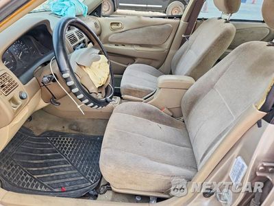 Zdjęcie 7 z 12 samochodu: 2002 TOYOTA COROLLA LE VIN:1NXBR12E42Z574329 - miniatura