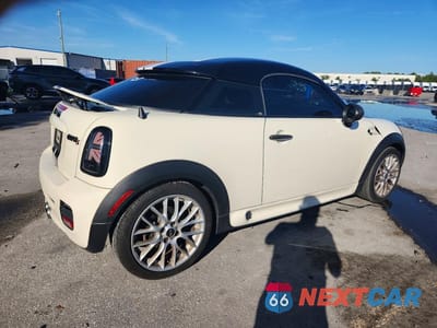 Trzecie zdjęcie samochodu z tyłu: 2013 MINI COOPER COUPE S VIN:WMWSX3C5XDT466775 - miniatura