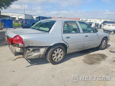 Trzecie zdjęcie samochodu z tyłu: 2004 MERCURY GRAND MARQUIS LS VIN:2MEFM75WX4X693833 - miniatura