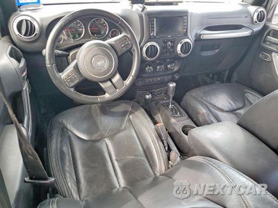 Zdjęcie 8 z 12 samochodu: 2016 JEEP WRANGLER UNLIMITED SAHARA VIN:1C4BJWEG8GL144113 - miniatura