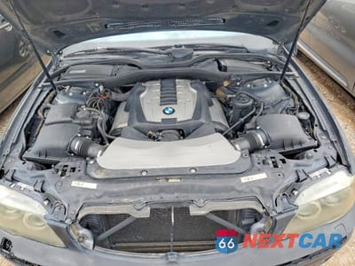 Zdjęcie 11 z 12 samochodu: 2006 BMW 750 I VIN:WBAHL83576DT05011 - miniatura