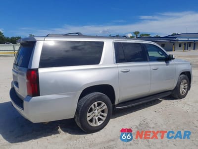 Trzecie zdjęcie samochodu z tyłu: 2019 CHEVROLET SUBURBAN C1500 LT VIN:1GNSCHKC6KR201509 - miniatura