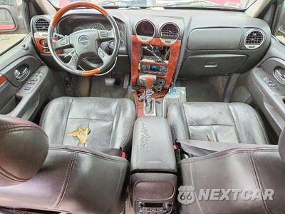 Zdjęcie 8 z 13 samochodu: 2006 GMC ENVOY DENALI XL VIN:1GKET66M866109584 - miniatura