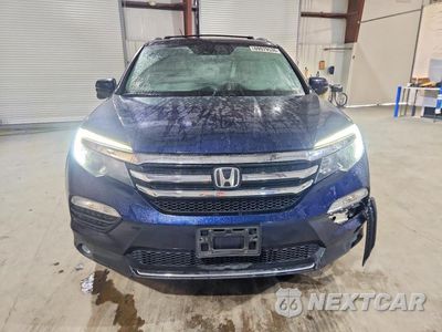 Piąte zdjęcie samochodu w środku: 2017 HONDA PILOT TOURING VIN:5FNYF6H99HB048343 - miniatura