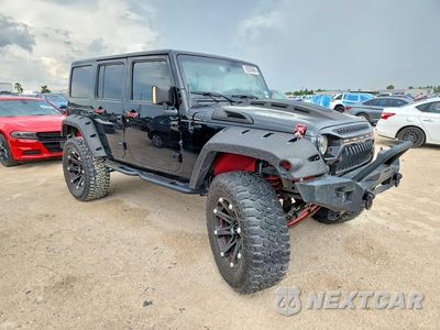Czwarte zdjęcie samochodu z boku: 2015 JEEP WRANGLER UNLIMITED SAHARA VIN:1C4BJWEG9FL648605 - miniatura