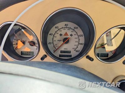 Zdjęcie 9 z 12 samochodu: 2003 MERCEDES-BENZ SLK 320 VIN:WDBKK65F43F276104 - miniatura